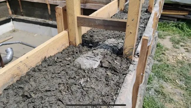 Утепление деревянного дома опилкобетоном: простой рецепт для долговечного результата