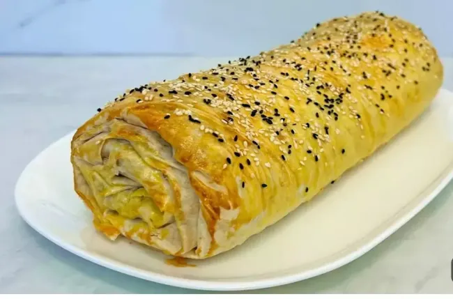 Рулет из лаваша с курицей и сыром за 20 минут: вкусный перекус для любого случая